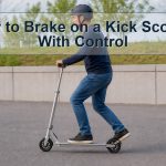 Unbranded kick scooter rear fender brake and safe foot position on dry pavement