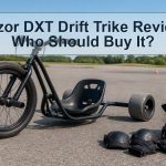 Unbranded pedal drift trike and protective gear on a private practice area